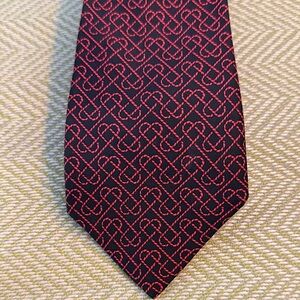 Hermes made in France silk tie No 7308 EA
Black w/ red hearts.